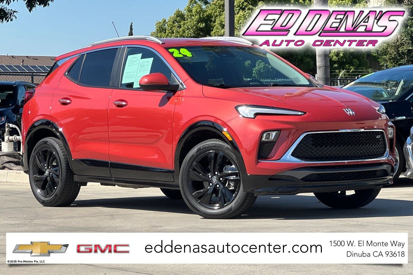 2024 Buick Encore GX Sport Touring in Sunrise Red Metallic — front three-quarter view